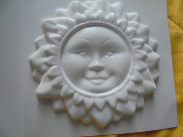 big sun with face